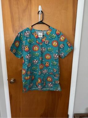 Uniform Advantage Teal Animal Face Print Scrub Top